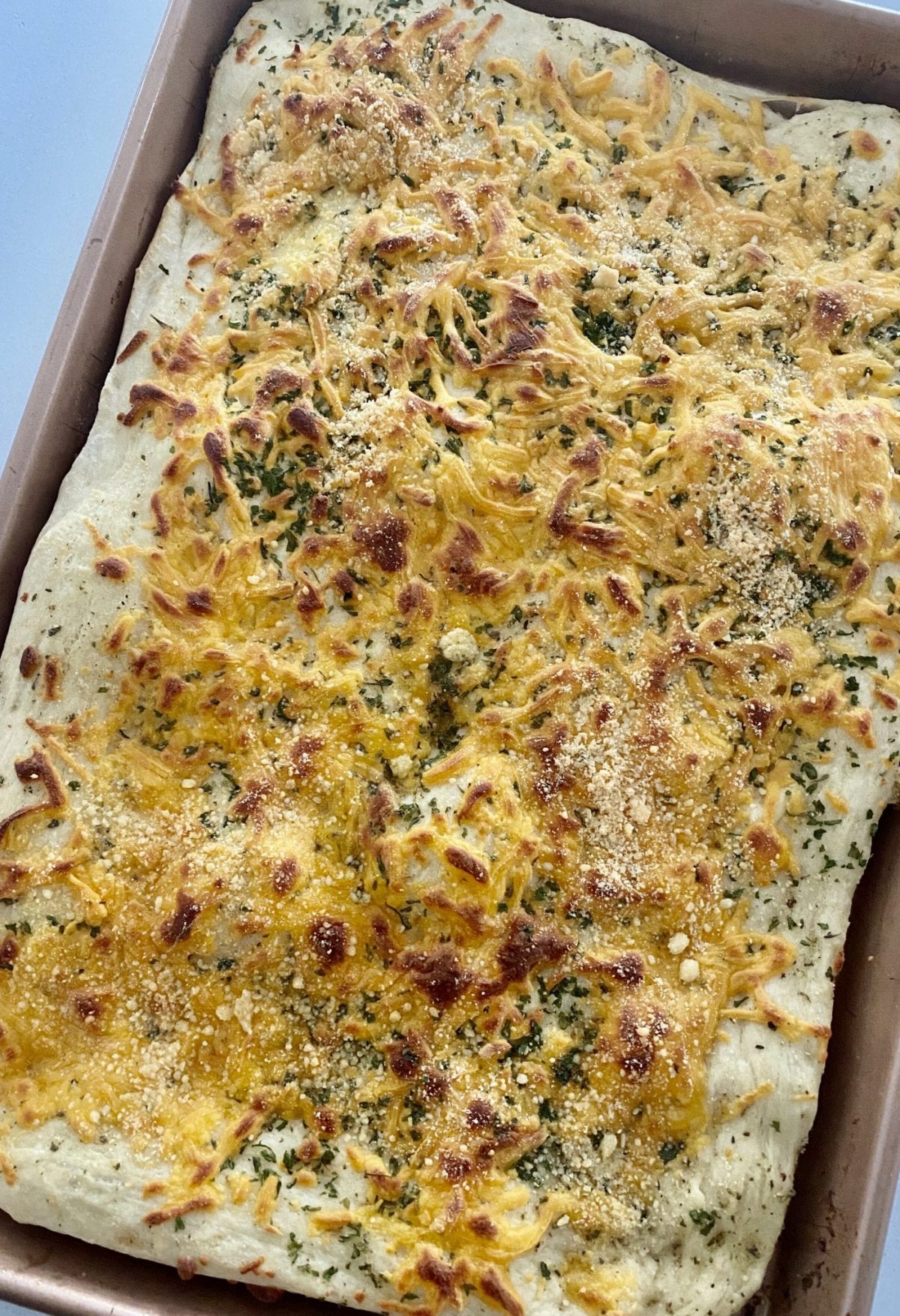 Cheesy Sheet Pan Breadsticks Pound Dropper