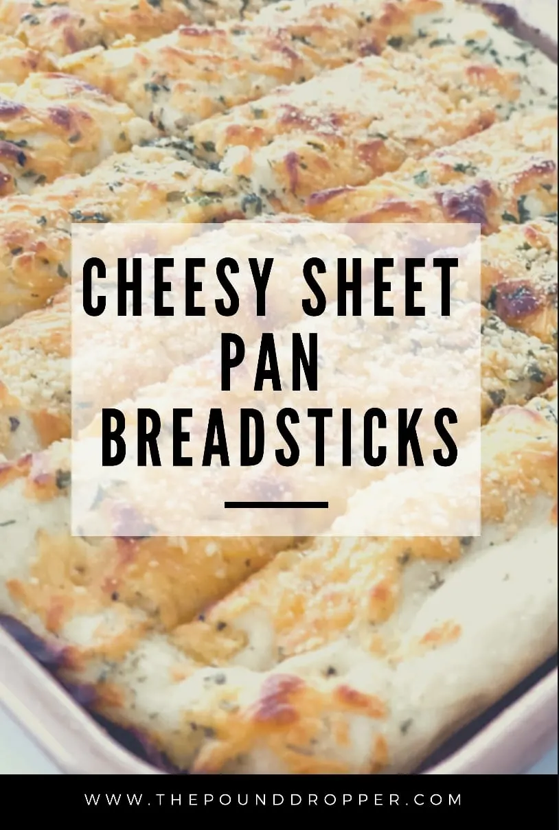 These Cheesy Sheet Pan Breadsticks are cheesy, buttery, and perfectly seasoned!  They are simple to make and are a perfect side dish to any meal! via @pounddropper