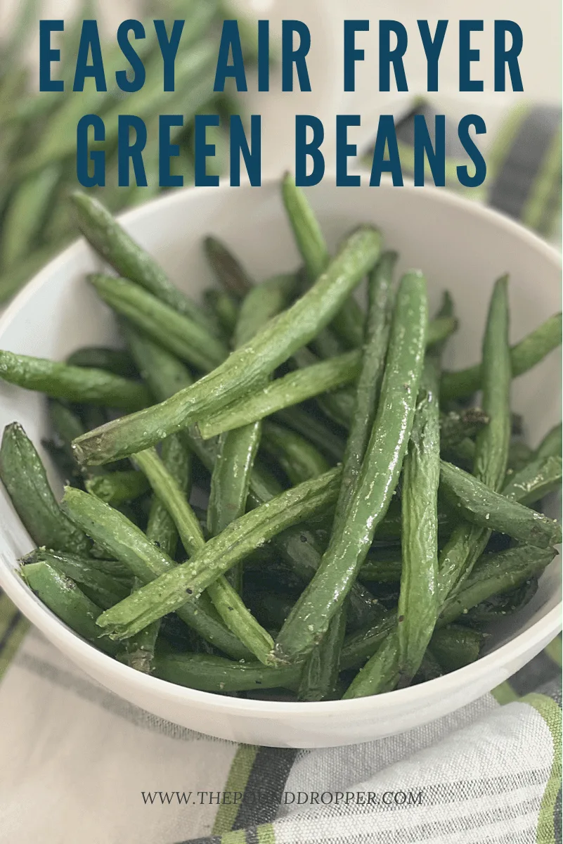 These Easy Air Fryer Green Beans will knock your socks off with how much flavor they have! These make for a quick and easy snack or side dish to any meal! via @pounddropper