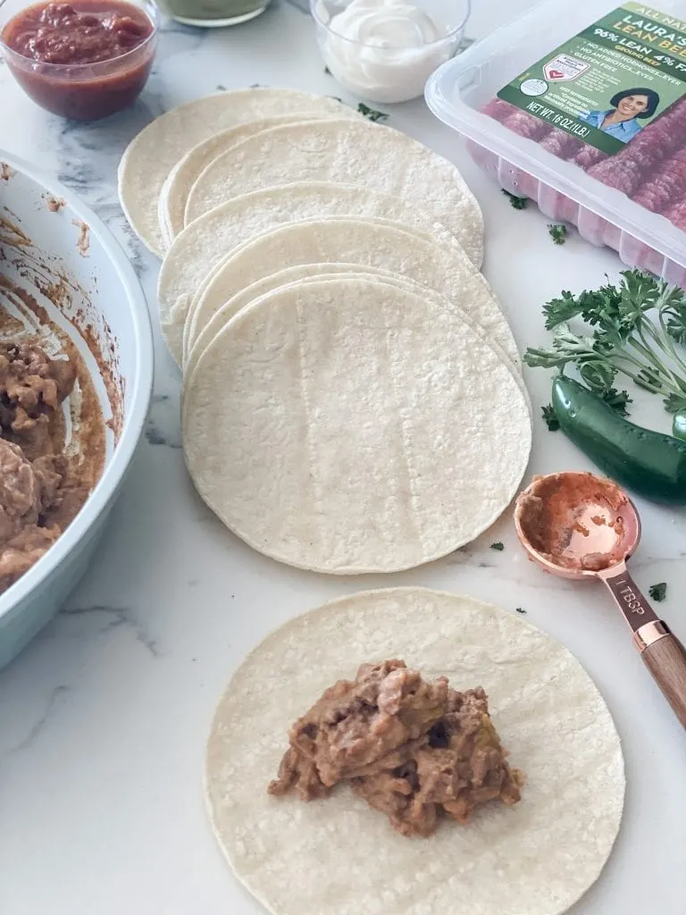 Easy Beef and Bean Taquitos (Baked or Air Fried) - Pound Dropper