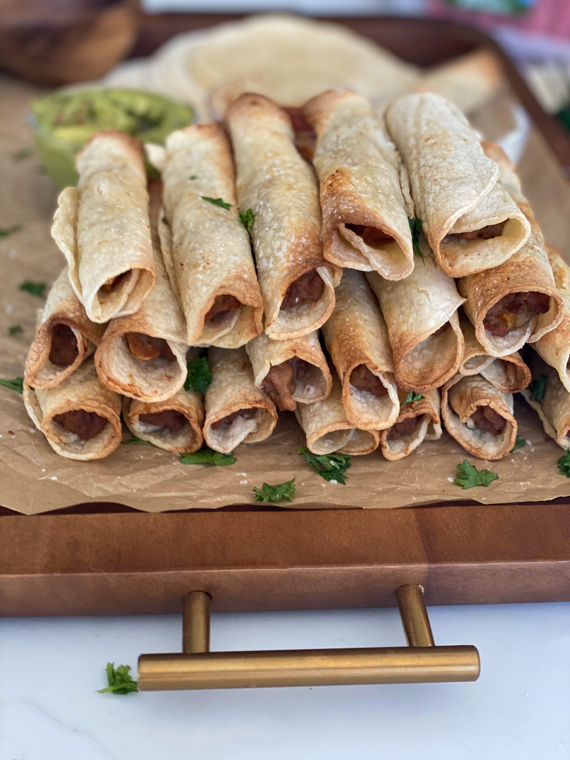 Easy Beef and Bean Taquitos (Baked or Air Fried) - Pound Dropper