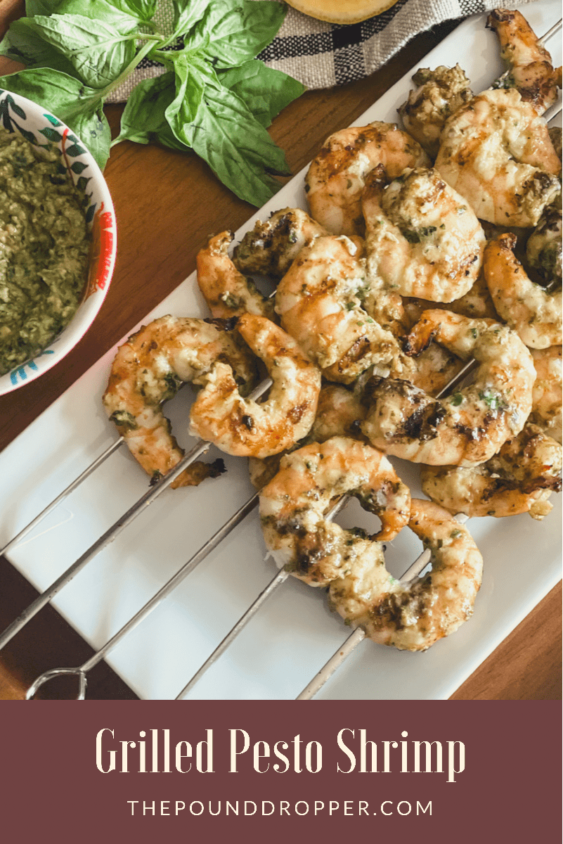 This Grilled Pesto Shrimp Skewer recipe is perfect for an easy appetizer, midweek dinner, or summer BBQ! via @pounddropper