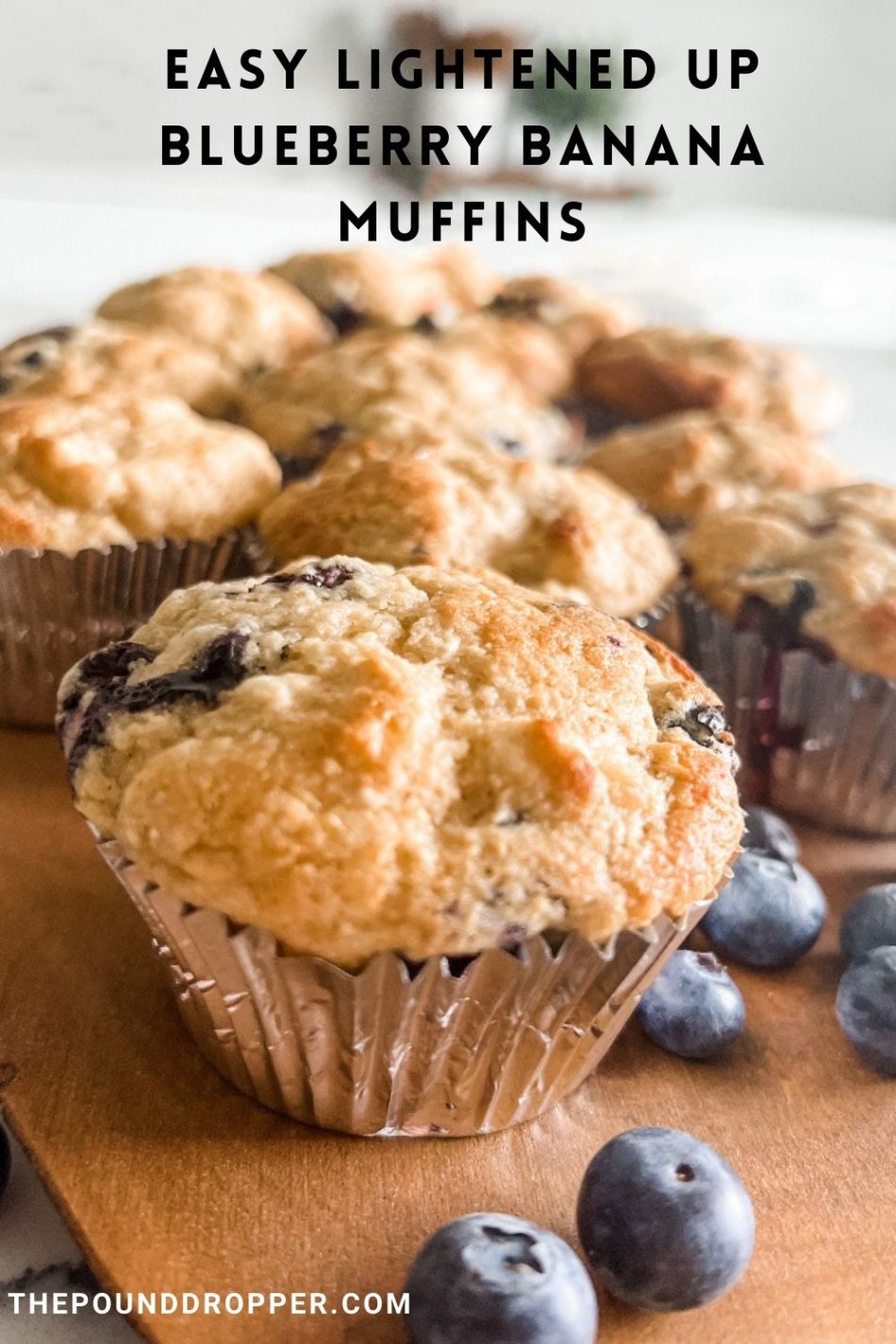If you love my One Point Blueberry Muffins then you will love these Easy Lightened Up Banana Blueberry Muffins! They are packed with protein and loaded with blueberries and bananas! via @pounddropper