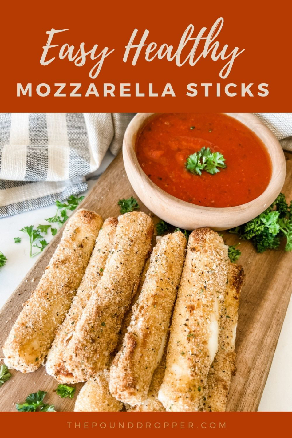 These Easy Healthy Mozzarella Sticks make a delicious game day snack or appetizer!  These are coated in a flour, egg wash, bread crumbs, seasonings, and then air fried or baked to golden perfection! Try dipping them in my homemade zero point marinara sauce! via @pounddropper