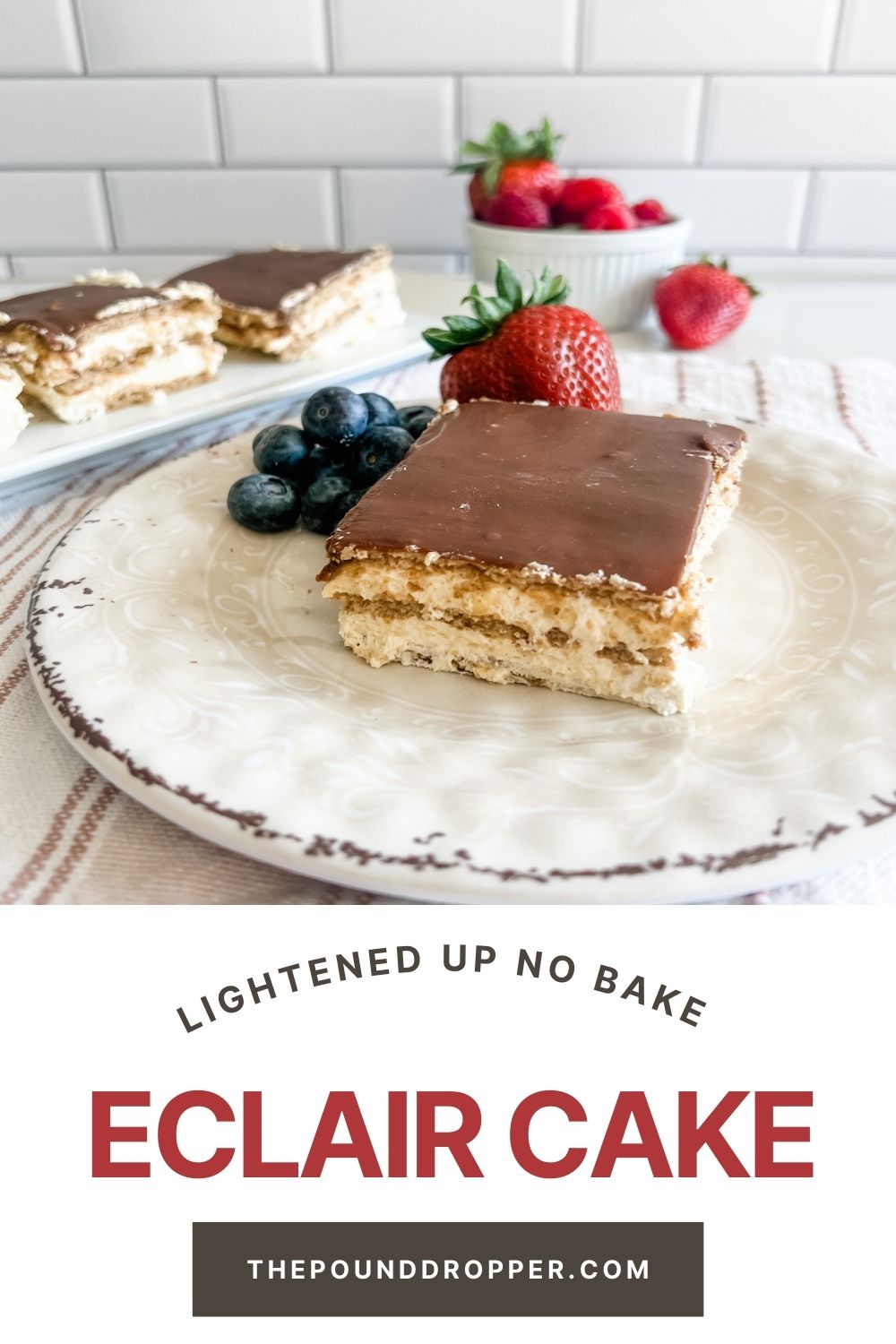 This Lightened Up Eclair Cake is lightened up version of an old fashioned icebox cake with layers of graham crackers, sugar free vanilla pudding, and sugar chocolate glaze. This is an easy no bake dessert recipe-perfect for any holiday or family gathering! via @pounddropper