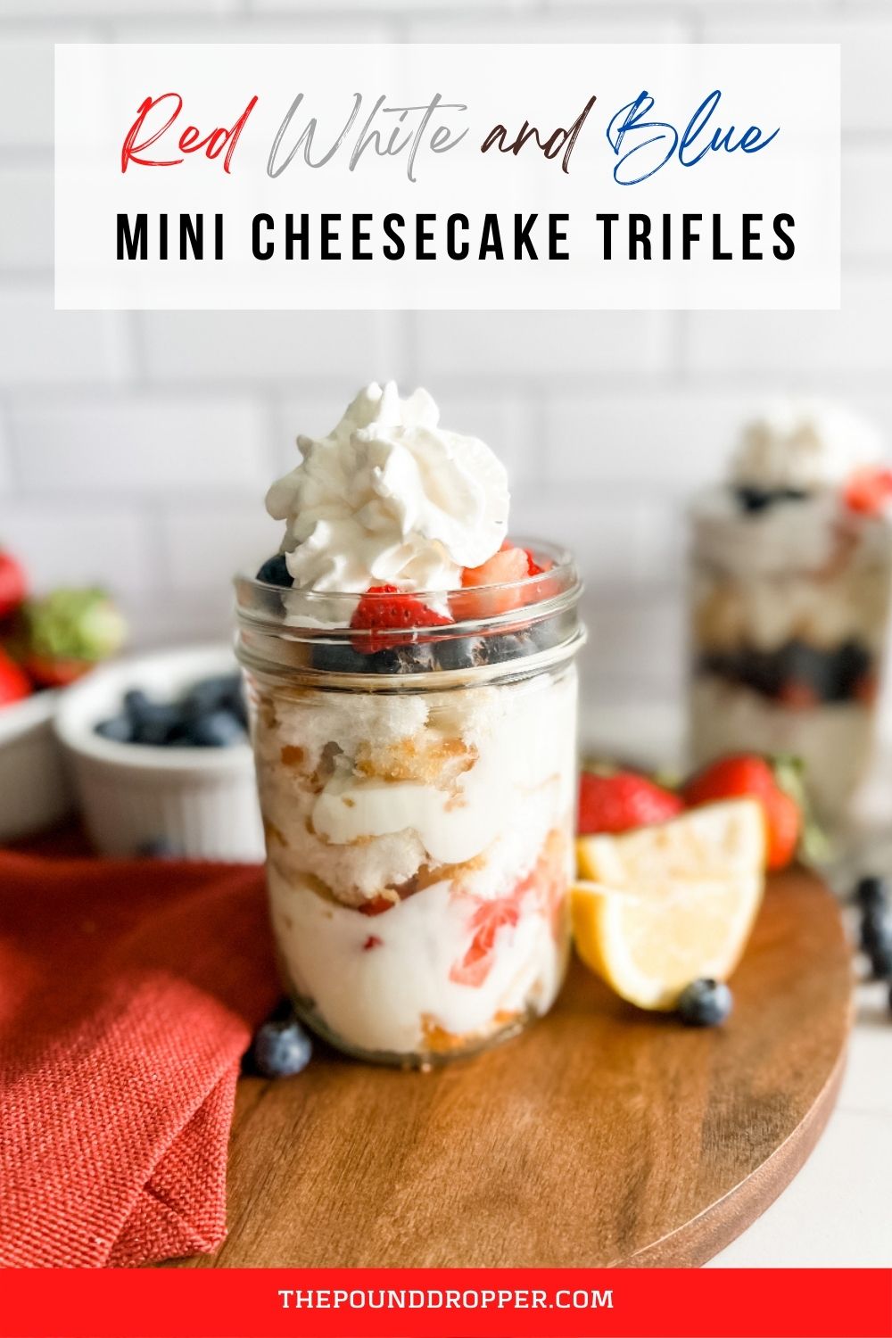 These Red White and Blue Mini Cheesecake Trifles are decadent, creamy, refreshing, and oh so delicious-packed with angel food cake, a homemade cheesecake yogurt layer, with juicy sweet strawberries, blueberries, and then topped with whipped topping! via @pounddropper