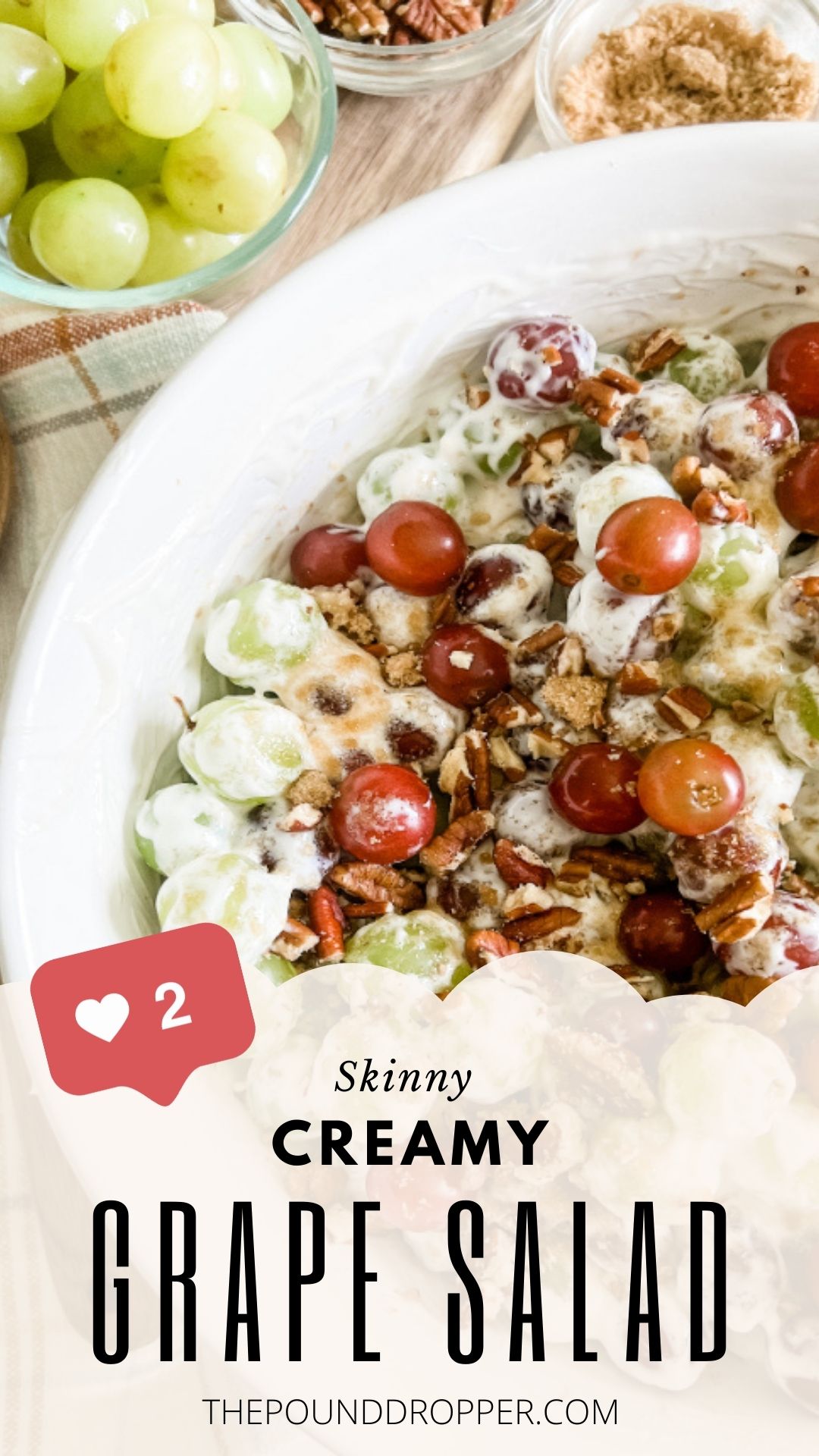 This Skinny Creamy Grape Salad is a tasty dessert salad- and summertime favorite at our house! A combination of bright green and red grapes slathered in a creamy lightened up cream cheese dressing and then topped with brown sugar and crunchy pecans. It's a crowd pleaser and great for potlucks!  via @pounddropper