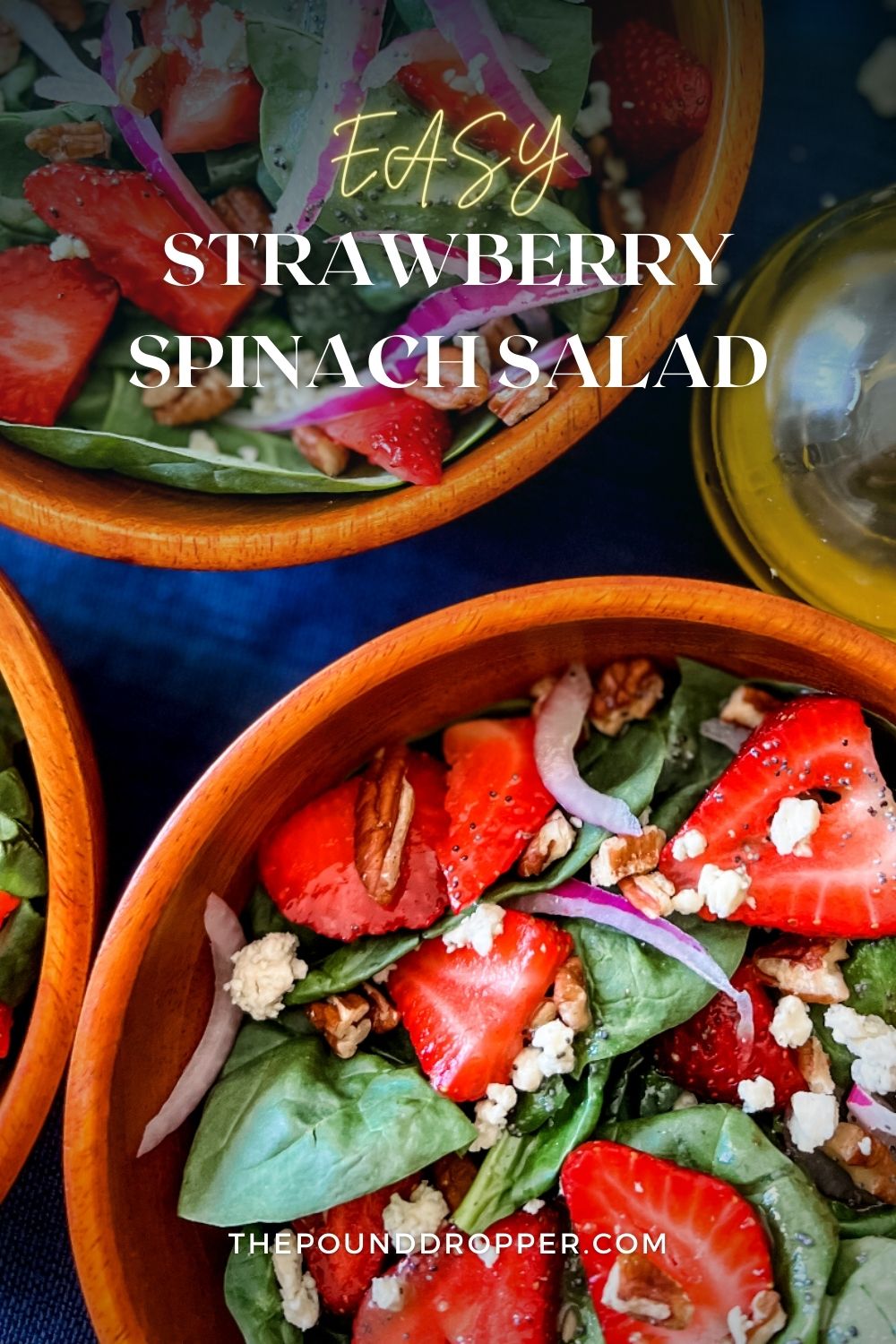 This Strawberry Spinach Salad is simple to make and is packed with baby spinach, juicy strawberries, toasted pecans, thinly sliced red onion and feta then drizzled with light Poppy Seed White Balsamic Dressing for the tastiest summer salad. It's quick and refreshing-perfect salad for potlucks, BBQ's, or summertime picnics. via @pounddropper