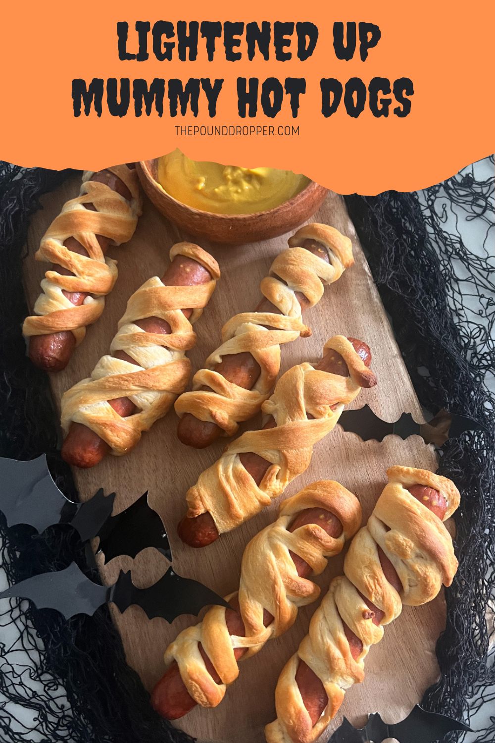 These easy and delicious Lightened Up Mummy Hot Dogs make for the perfect Halloween party snack or appetizer! Ready in just 20 minutes and requires just three ingredients! A fun family friendly, lightened up Halloween recipe that's sure to be a huge hit! via @pounddropper