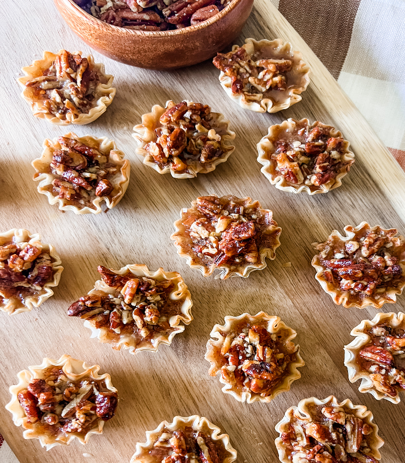 Phyllo pastry cups filled with traditional pecan pie. Take pecan