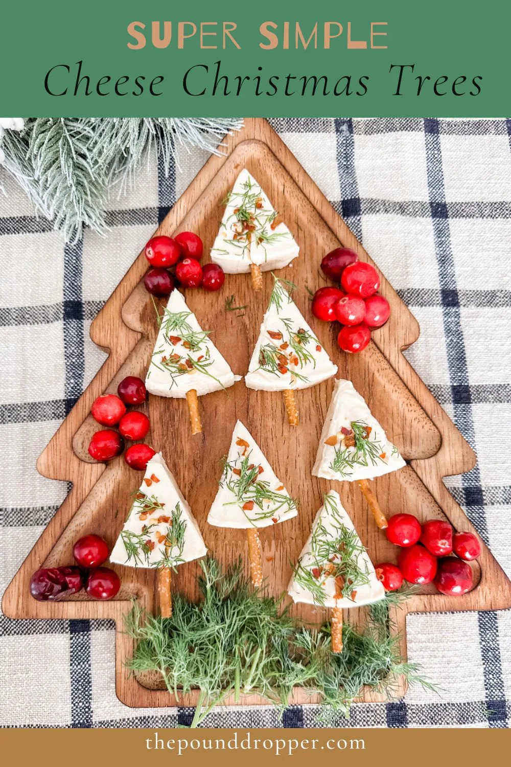 Here's a Pinterest inspired festive Christmas Tree Cheese Board that will impress your guests with this holiday season! A quick and easy festive appetizer using just 4 simple ingredients! via @pounddropper