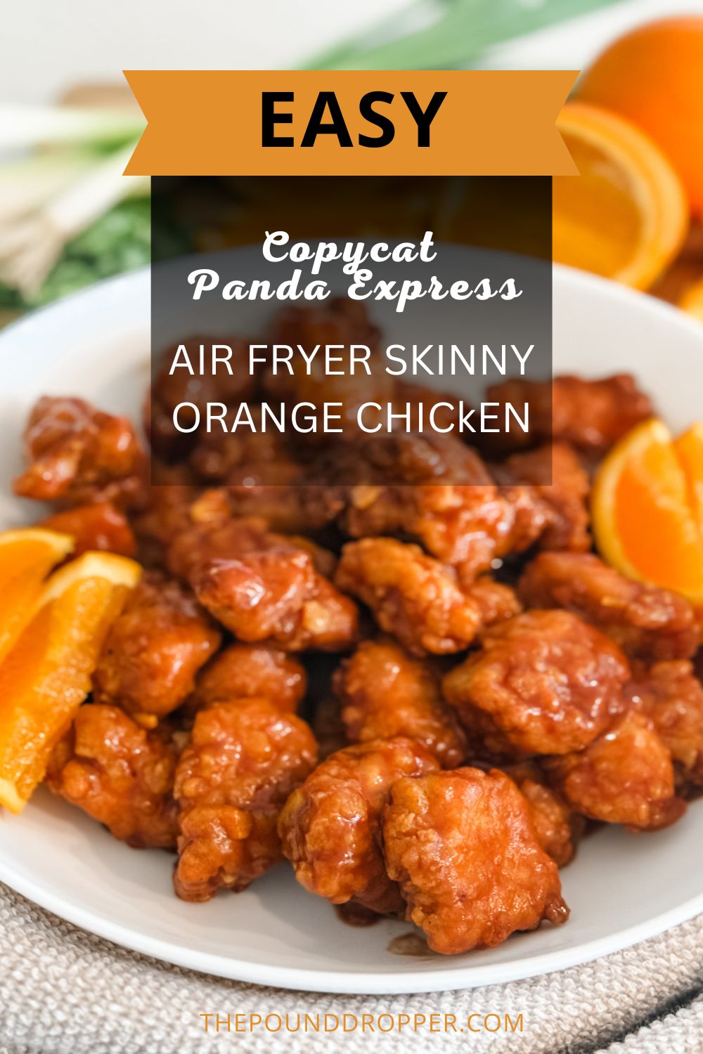 This Easy Air Fry Skinny Orange Chicken (Panda Express Copycat) makes for a quick dinner and tastes better than takeout! You'll love how easy this recipe is for your weekly dinner rotation! Made with just 5 ingredients and packed with 28 grams of protein per serving! via @pounddropper