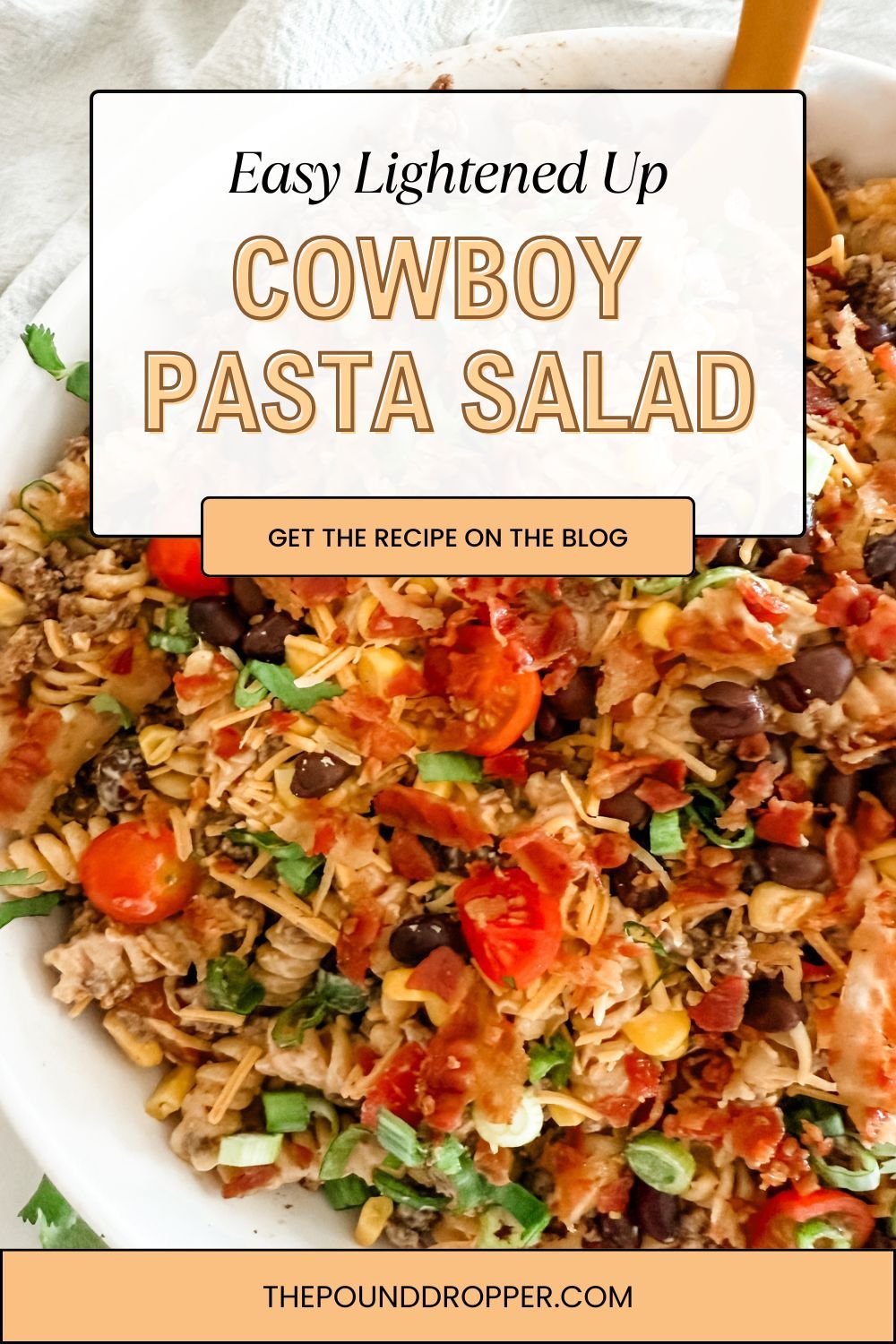 This Lightened Up Cowboy Pasta Salad is a taco-inspired pasta salad that is packed with so much goodness, such as black beans, corn, cheese, tomatoes, cilantro, and protein packed pasta, and lean ground beef. It's a filling pasta salad that's perfect for those busy summer days!  A must make for your next potluck or gathering! via @pounddropper